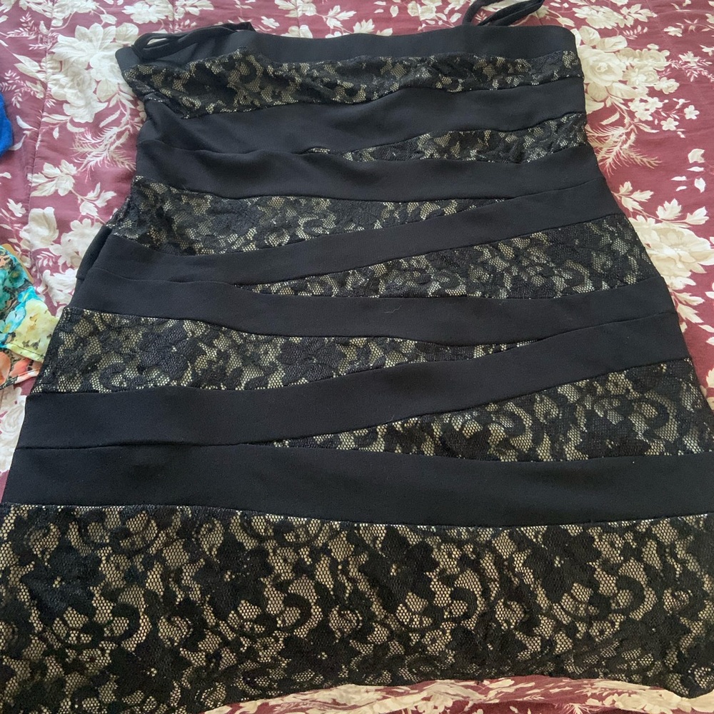 Black and “nude” mini dress